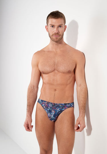 Man wearing a patterned underwear on a white background