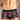 Man wearing a black and red patterned underwear against a neutral background