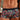 Colorful patterned underwear worn by a person with a blurred background