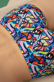 Colorful geometric-patterned shorts on a male model
