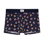 A pair of navy blue boxer briefs with a multicolored heart pattern and a wide red elastic waistband.