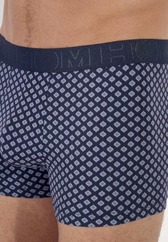 Navy patterned boxer briefs with a brand logo on the waistband.