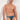 Man wearing blue briefs with a pattern against a white background